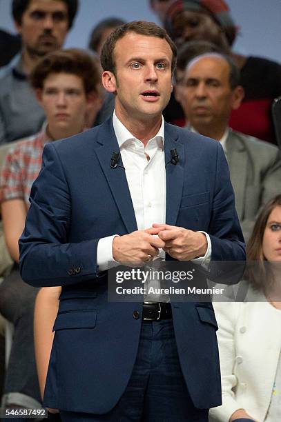 French Minister of Economic, Emmanuel Macron addresses an estimated 3000 people during the 'En Marche' political party meeting at Theatre de la...