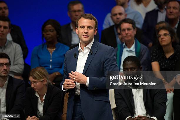 French Minister of Economic, Emmanuel Macron addresses an estimated 3000 people during the 'En Marche' political party meeting at Theatre de la...