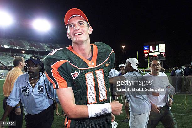 Ken Dorsey of the Miami Hurricanes leaves the field with a smile on his face after beating the Syracuse Orangemen 59-0 at the Orange Bowl in Miami...