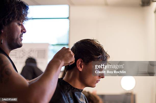 Backstage preparations at the Garciavelez presentation during New York Fashion Week: Men's S/S 2017 at Skylight Clarkson Sq on July 12, 2016 in New...