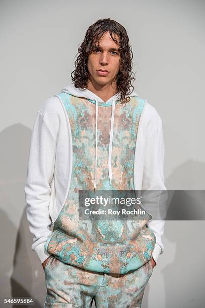 Model poses at the Garciavelez presentation during New York Fashion Week: Men's S/S 2017 at Skylight Clarkson Sq on July 12, 2016 in New York City.