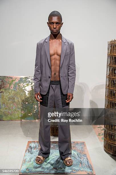 Model poses at the Garciavelez presentation during New York Fashion Week: Men's S/S 2017 at Skylight Clarkson Sq on July 12, 2016 in New York City.