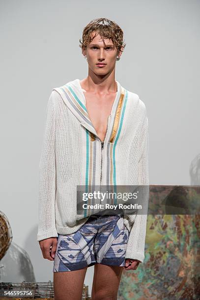 Model poses at the Garciavelez presentation during New York Fashion Week: Men's S/S 2017 at Skylight Clarkson Sq on July 12, 2016 in New York City.