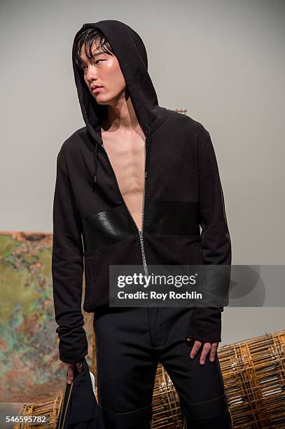 Model poses at the Garciavelez presentation during New York Fashion Week: Men's S/S 2017 at Skylight Clarkson Sq on July 12, 2016 in New York City.