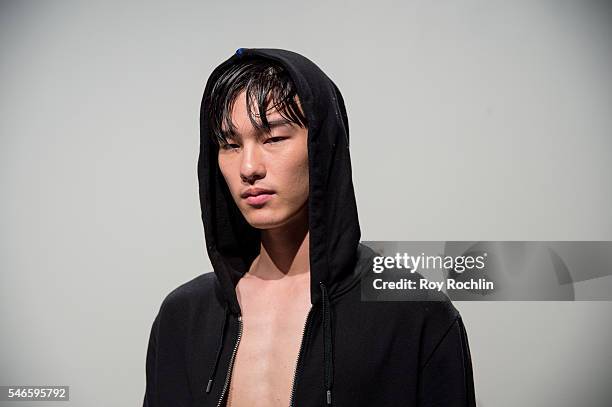 Model poses at the Garciavelez presentation during New York Fashion Week: Men's S/S 2017 at Skylight Clarkson Sq on July 12, 2016 in New York City.