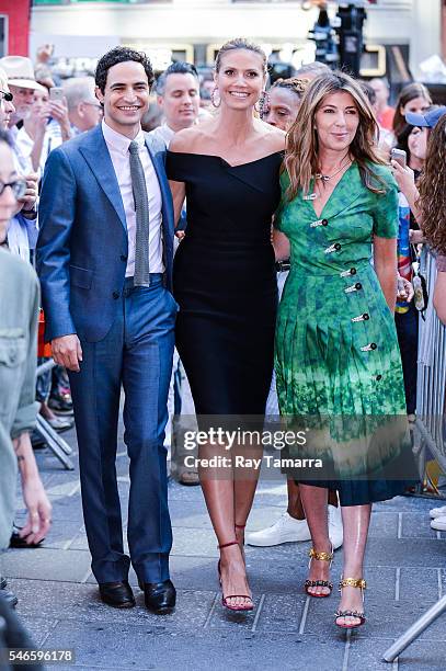 Television personalities Zac Posen, Heidi Klum, and Nina Garcia leave the "Good Morning America" taping at the ABC Times Square Studios on July 12,...