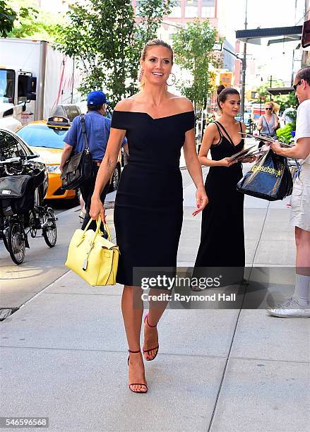 Model Heidi Klum is seen walking in Soho on July 12, 2016 in New York City.