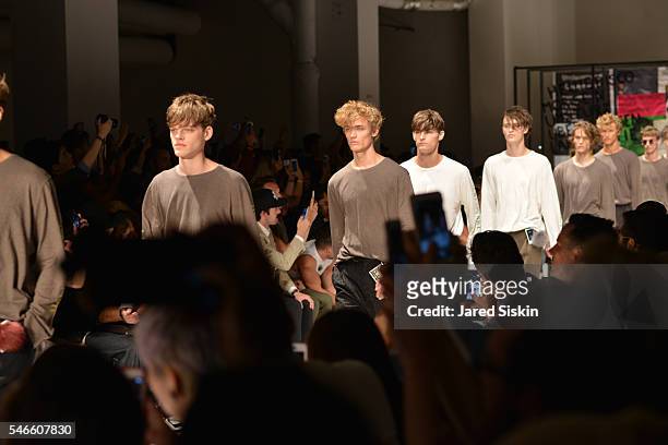 Runway finale of the Robert Geller show during New York Fashion Week: Men's S/S 2017 at Skylight Clarkson Square on July 12, 2016 in New York City.