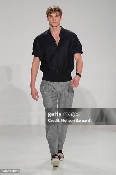 Model walks the runway at the Cadet - New York Fashion Week: Men's S/S 2017 at Skylight Clarkson Sq on July 12, 2016 in New York City.