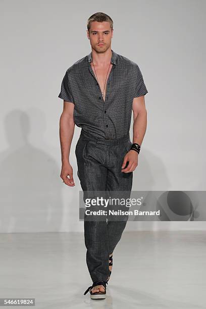 Model walks the runway at the Cadet - New York Fashion Week: Men's S/S 2017 at Skylight Clarkson Sq on July 12, 2016 in New York City.