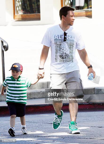 Beverly Hills, California, March 17, 2010 Mark Wahlberg and son Brendan in Brentwood wearing some green sneakers on Saint Patrick's Day REV/100317991