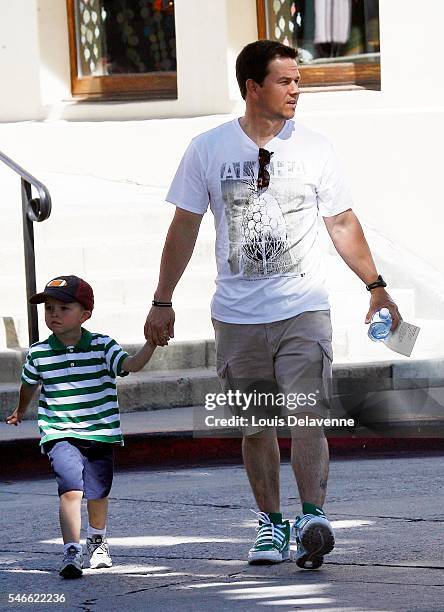 Beverly Hills, California, March 17, 2010 Mark Wahlberg and son Brendan in Brentwood wearing some green sneakers on Saint Patrick's Day REV/100317991