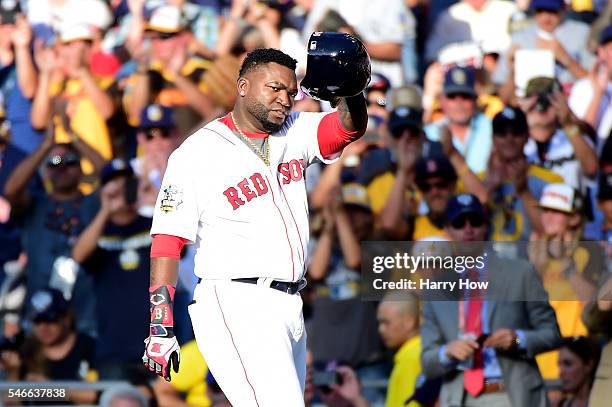 David Ortiz of the Boston Red Sox and the American League waves to the crowd after he is taken out of the game in the third inning during the 87th...