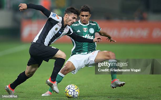 Erik of Palmeiras fights for the ball with Zeca of Santos during the match between Palmeiras and Santos for the Brazilian Series A 2016 at Allianz...
