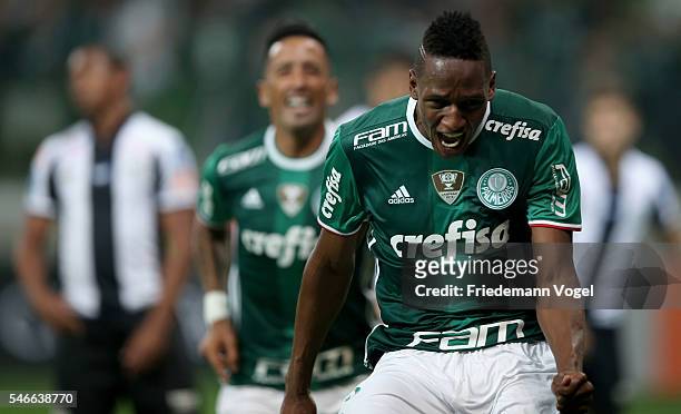 Yerry Mina of Palmeiras celebrates scoring the first goal during the match between Palmeiras and Santos for the Brazilian Series A 2016 at Allianz...