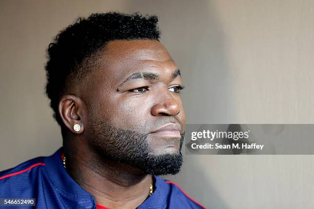 David Ortiz of the Boston Red Sox and the American League sits in the dugout after he is taken out of the game in the third inning during the 87th...