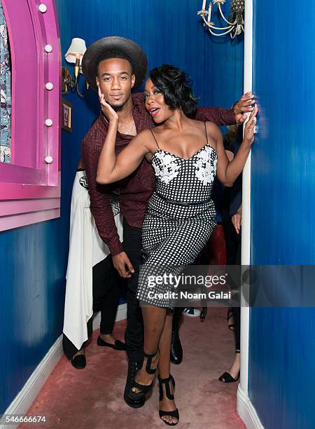 Actors Jessie T. Usher and Tichina Arnold attend "Survivor's Remorse" New York screening after party at Roxy Hotel on July 12, 2016 in New York City.