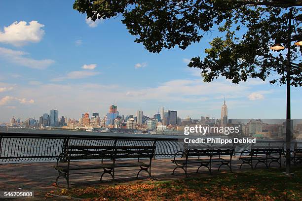 usa, new jersey, hoboken, midtown manhattan skyline as seen from pier a park - hudson river stock pictures, royalty-free photos & images
