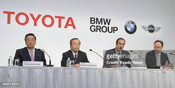 Japan - Officials from Japan's Toyota Motor Corp. And Germany's BMW AG, including Toyota Executive Vice President Takeshi Uchiyamada and Klaus...