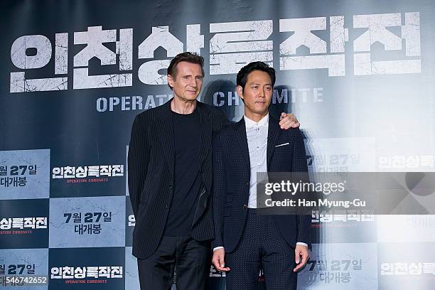 Actors Liam Neeson and Lee Jung-Jae attend the press conference for 'Operation Chromite' on July 13, 2016 in Seoul, South Korea. The film will open...