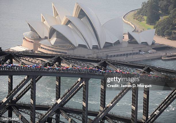Bridge climbers on Bridgeclimb on October 2, 2008 in Sydney, Australia. To celebrate their 10th anniversary the climb had people hold the flags of...