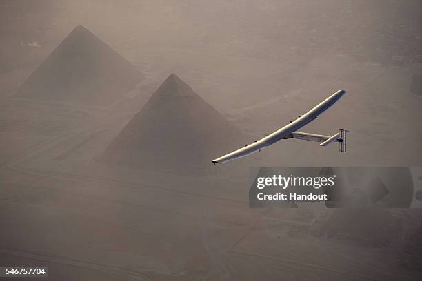 In this handout image supplied by Jean Revillard, Solar Impulse 2, the solar powered plane, piloted by Swiss pioneer Andre Borschberg is seen during...