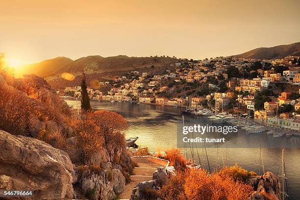 sunrise on symi, greece - symi stock pictures, royalty-free photos & images