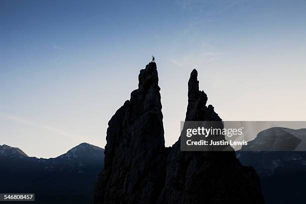 man alone waves from peak - wonderlust2015 stock pictures, royalty-free photos & images