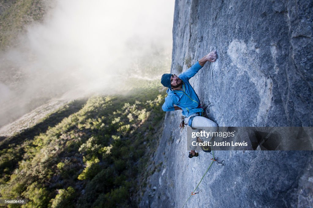 Solo Guy Climbs Rock Wall