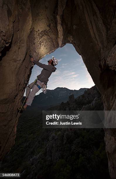 climber in challenging pose - wonderlust2015 stock pictures, royalty-free photos & images