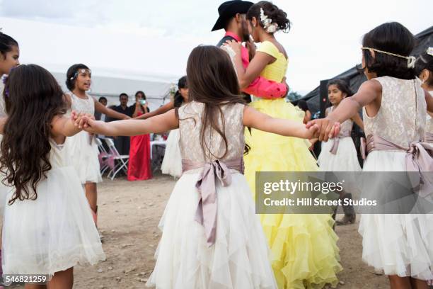 hispanic community dancing at quinceanera - heritage round two imagens e fotografias de stock