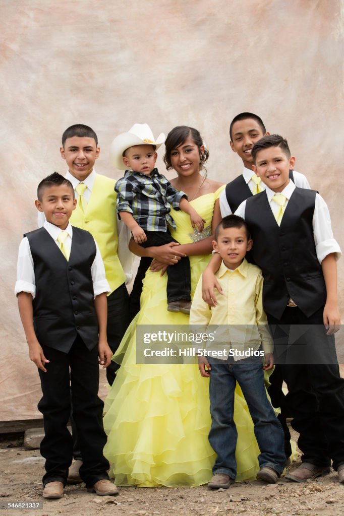 Hispanic family celebrating quinceanera