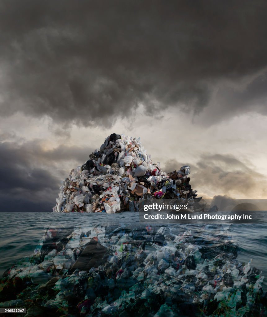 Garbage mound floating in stormy sea