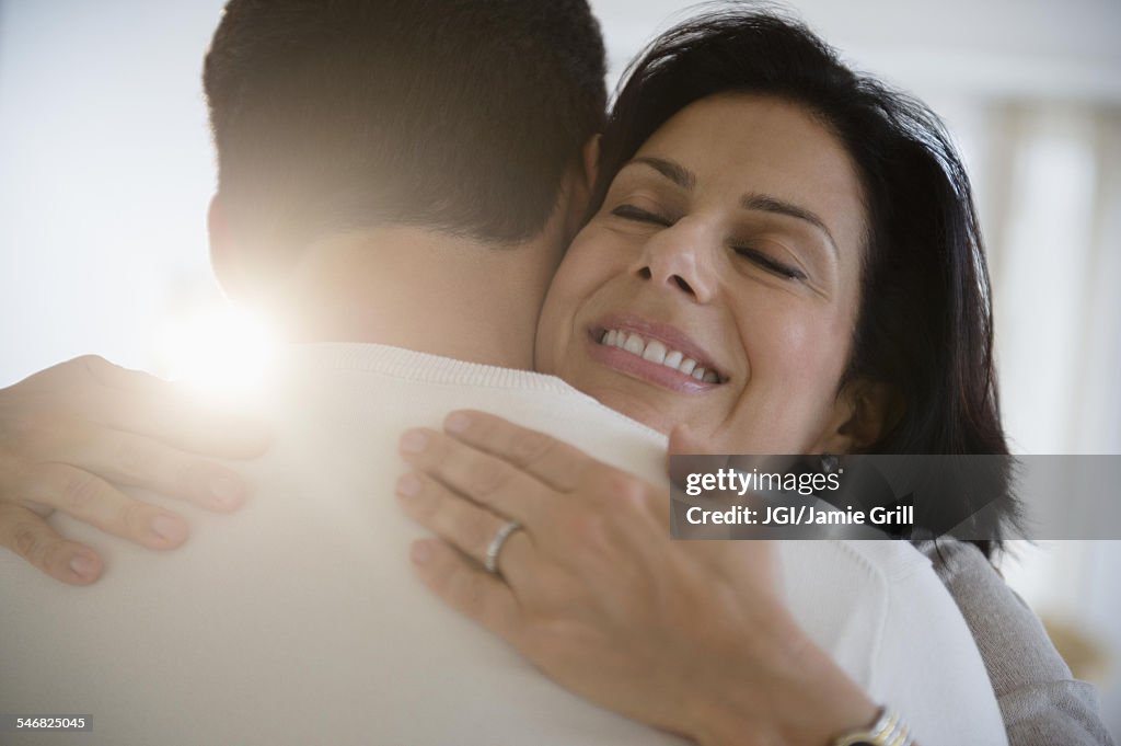 Close up of couple hugging