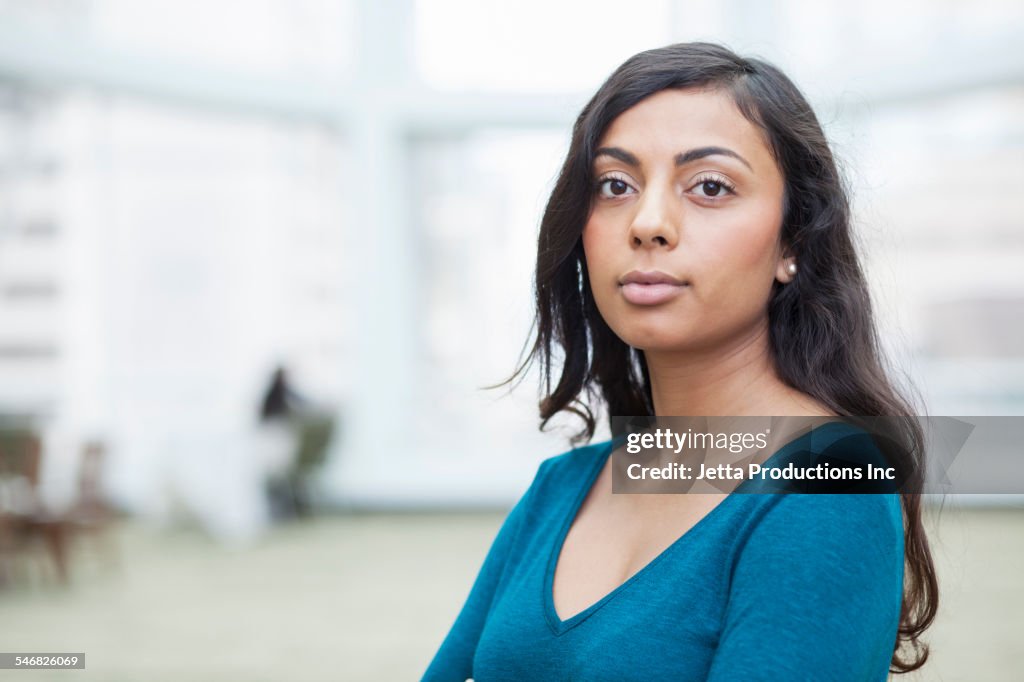 Indian businesswoman standing in office