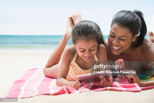Supeg Family Beach Tablet Photos and Premium High Res Pictures - Getty Images