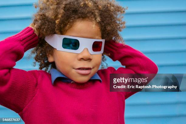 pacific islander boy wearing 3d glasses - 3 d glasses stock pictures, royalty-free photos & images