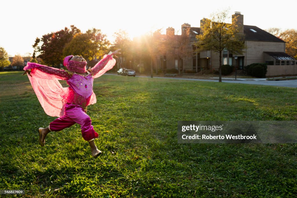 African American girl dancing in princess costume