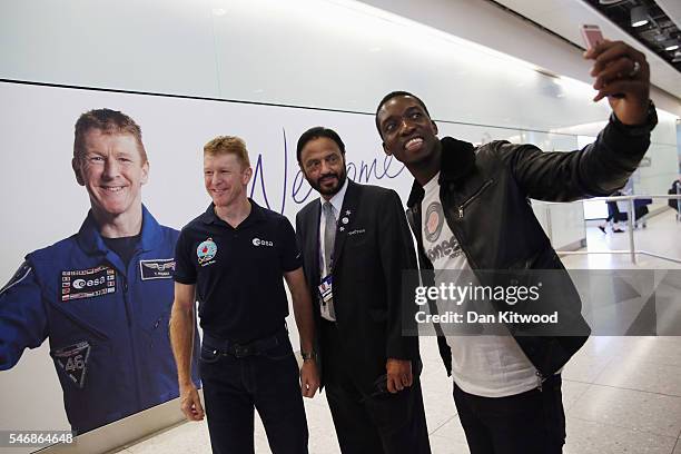 British astronaut Tim Peake has selfies taken after he arrived at Heathrow Airport on a flight from Houston on July 13, 2016 in London, England....