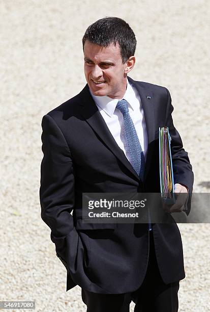 French Prime minister, Manuel Valls leaves the Elysee Presidential Palace after a weekly cabinet meeting on July 13, 2016 in Paris, France.