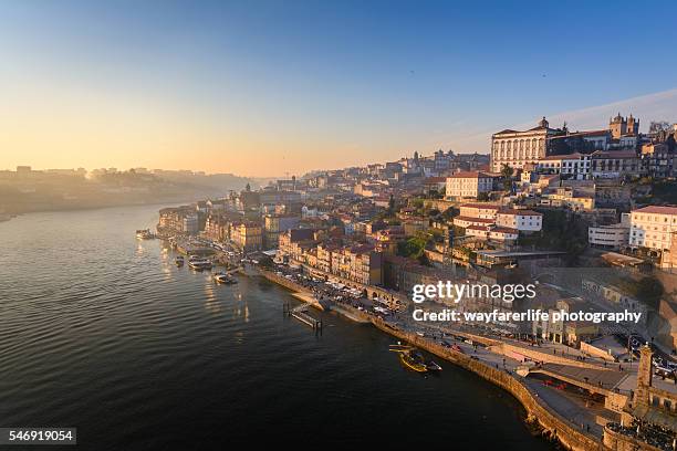 douro river and porto old town at sunset, portugal - oporto portugal stockfoto's en -beelden