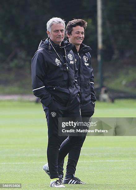 Manager Jose Mourinho and Assistant Manager Rui Faria of Manchester United in action during a first team training session at Aon Training Complex on...