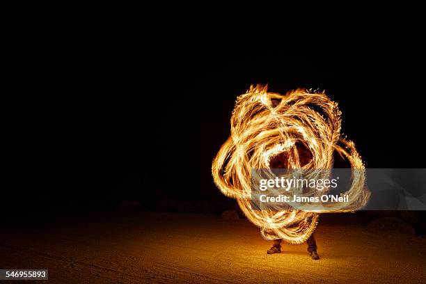 fire poi trails - light painting stock pictures, royalty-free photos & images