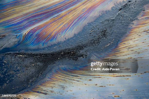 albania, fier, colored oil spill - industrial pollution stock pictures, royalty-free photos & images