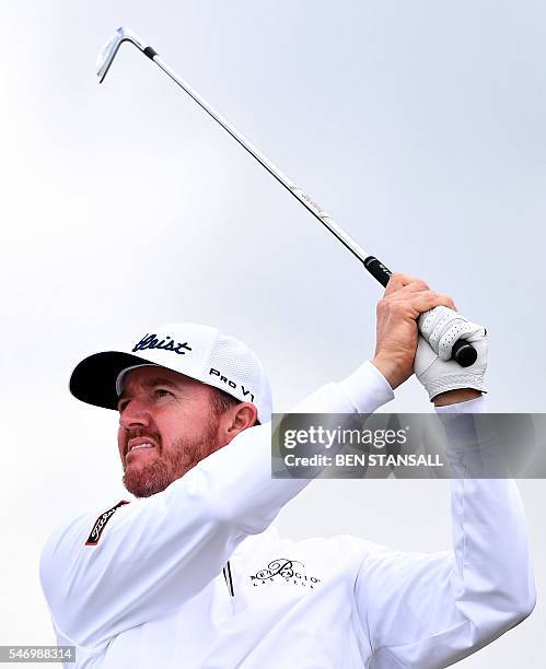 Golfer Jimmy Walker watches his shot from the 14th tee during practice on July 13 ahead of the 2016 British Open Golf Championship at Royal Troon in...