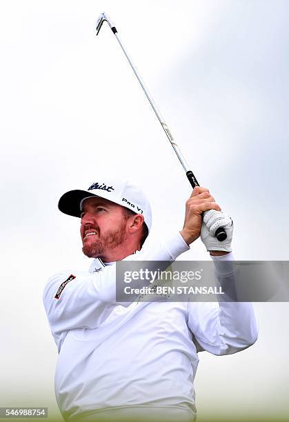 Golfer Jimmy Walker watches his shot from the 14th tee during practice on July 13 ahead of the 2016 British Open Golf Championship at Royal Troon in...