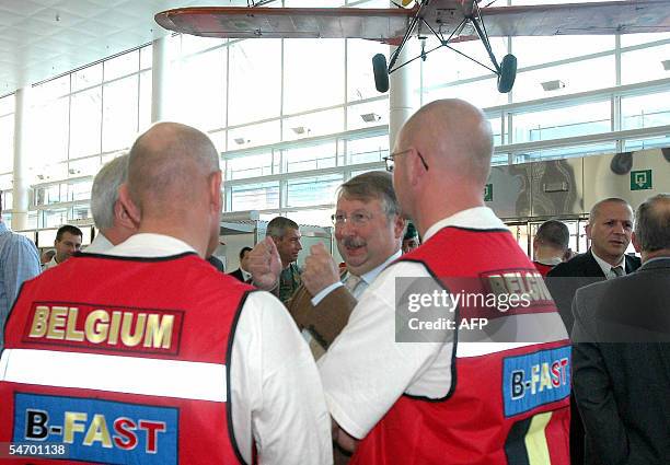 Members of the Belgian B-Fast team talk to Defence Minister Andre Flahaut prior to leaving for Atlanta to help people affected by Hurricane Katrina...
