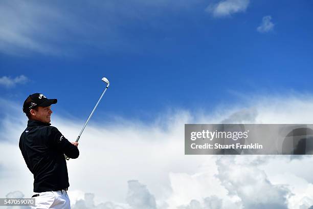 Danny Willett of England hits a tee shot during a practice round ahead of the 145th Open Championship at Royal Troon on July 13, 2016 in Troon,...