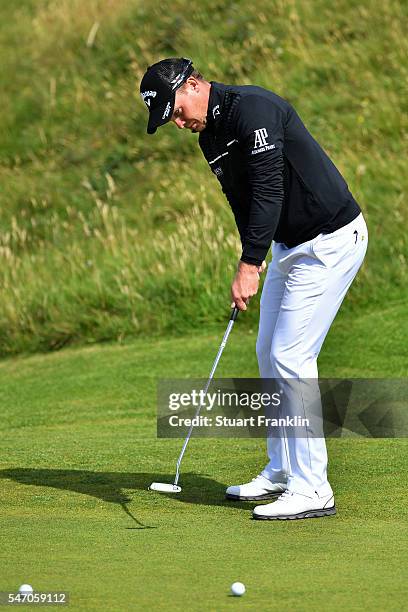 Danny Willett of England lines up a putt during a practice round ahead of the 145th Open Championship at Royal Troon on July 13, 2016 in Troon,...