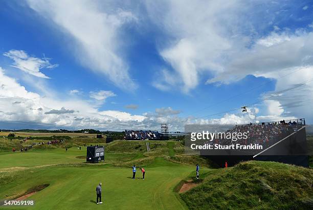 Tommy Fleetwood of England putts on the 8th during a practice round ahead of the 145th Open Championship at Royal Troon on July 13, 2016 in Troon,...